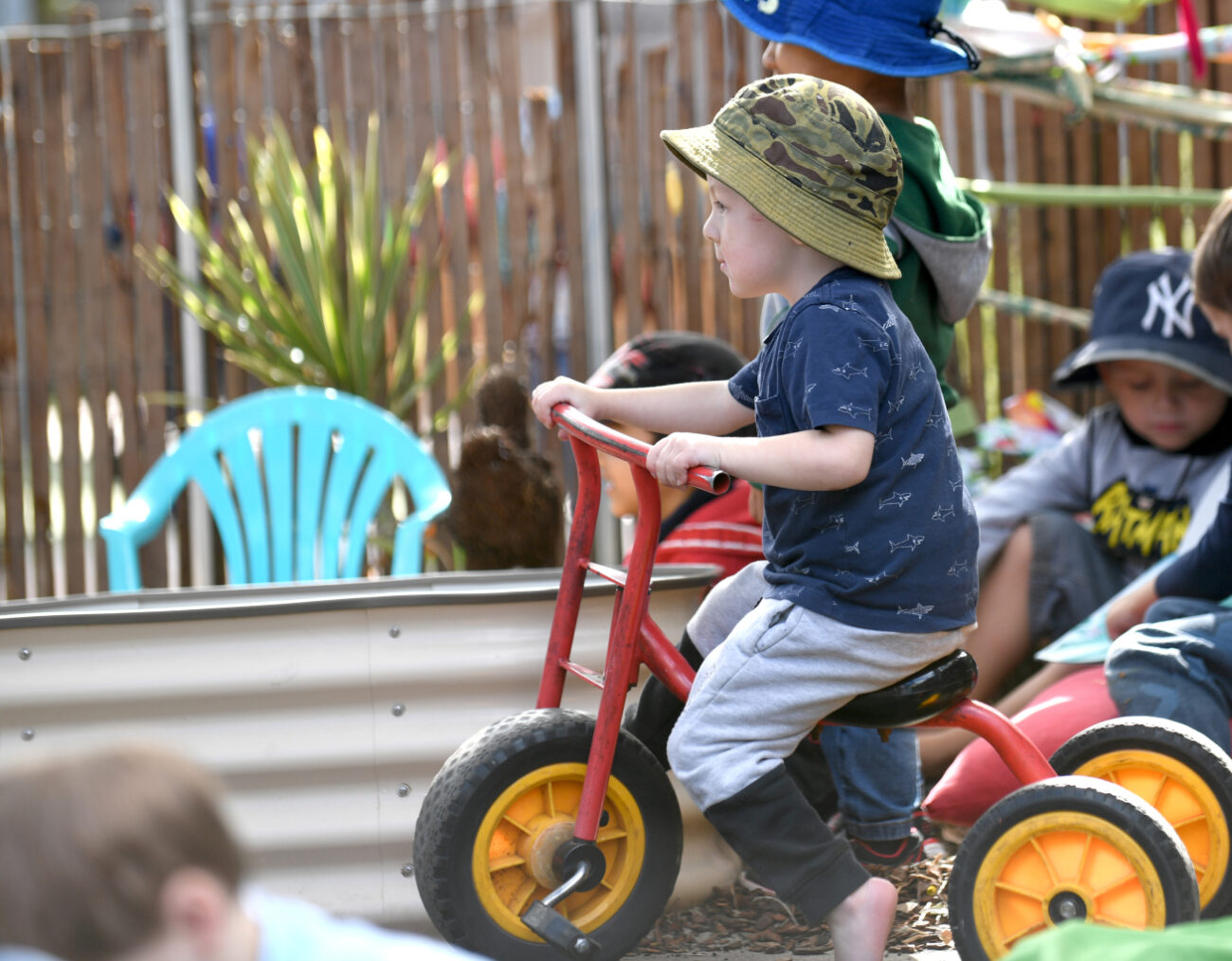 Children interacting playing, learning new skills - Evolving Minds Early Learning Wooloowin Qld